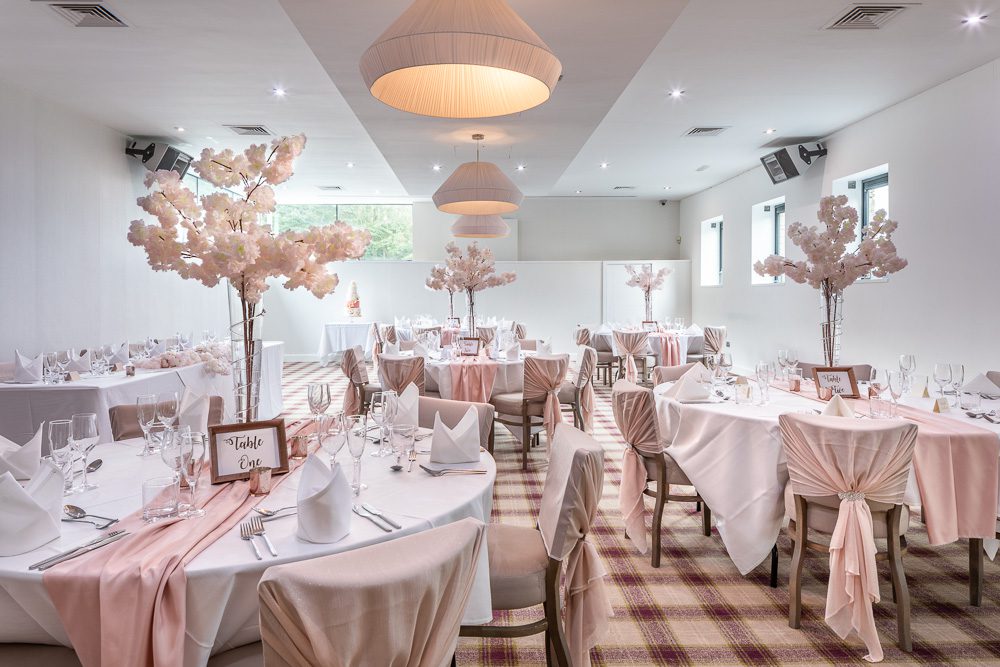 Blossom positioned in the centre of tables